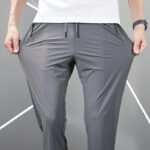 Disai Celana Panjang Unisex Saku Ritsleting Icy Silk K6601: Nyaman Tanpa Batas untuk Segala Aktivitas